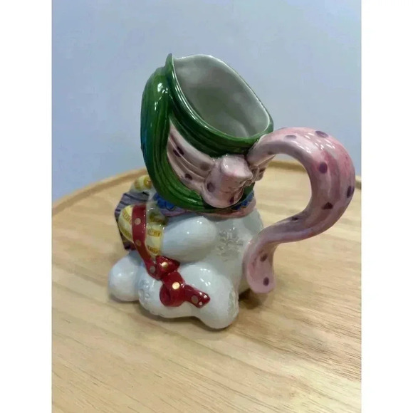 Fitz and Floyd Snowman Creamer from Frosty Folks Collection Holding Gift - Picture 2 of 7